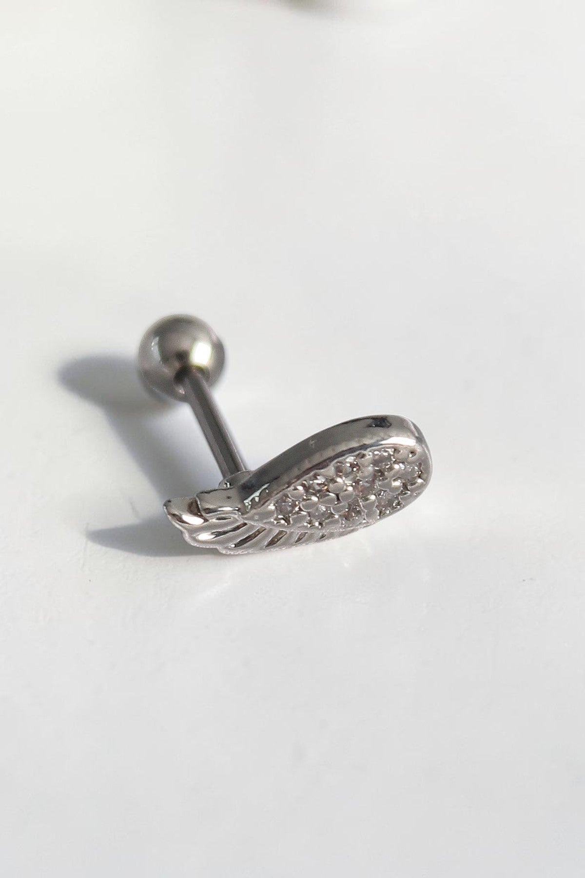 VORA HOUSE gümüş rengi zirkon taşlı kanat figürlü 316L paslanmaz çelik tragus piercing