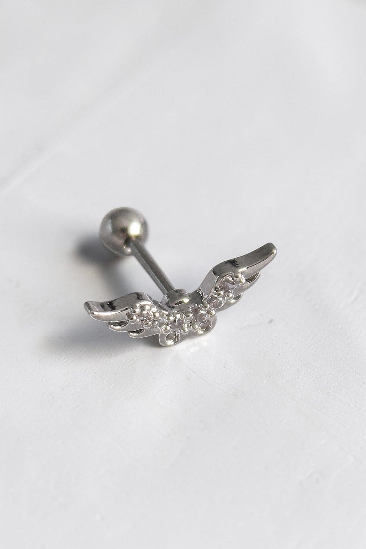 VORA HOUSE gümüş rengi zirkon taşlı kanat figürlü 316L paslanmaz çelik tragus piercing