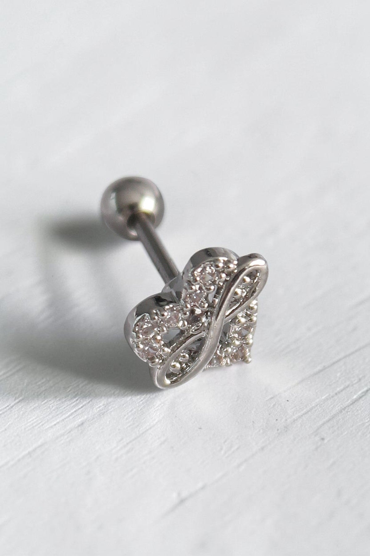 VORA HOUSE gümüş rengi zirkon taşlı sonsuzluk detaylı 316L paslanmaz çelik tragus piercing
