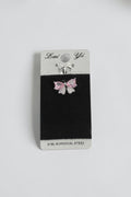 VORA HOUSE 316L surgical steel belly piercing featuring a pink zircon bow design with sparkling crystal accents.