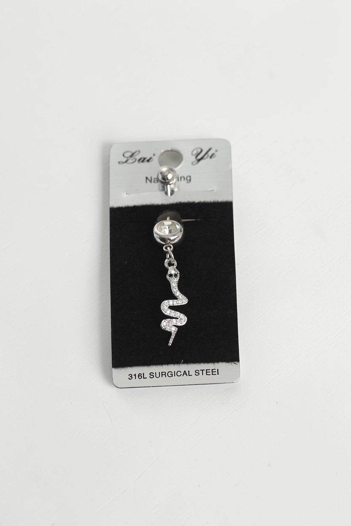 VORA HOUSE 316L surgical steel belly button piercing featuring a dangling snake pendant with sparkling zircon stones.