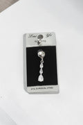 VORA HOUSE 316L surgical steel belly button ring featuring three dangling teardrop-shaped zircon stones on a card.