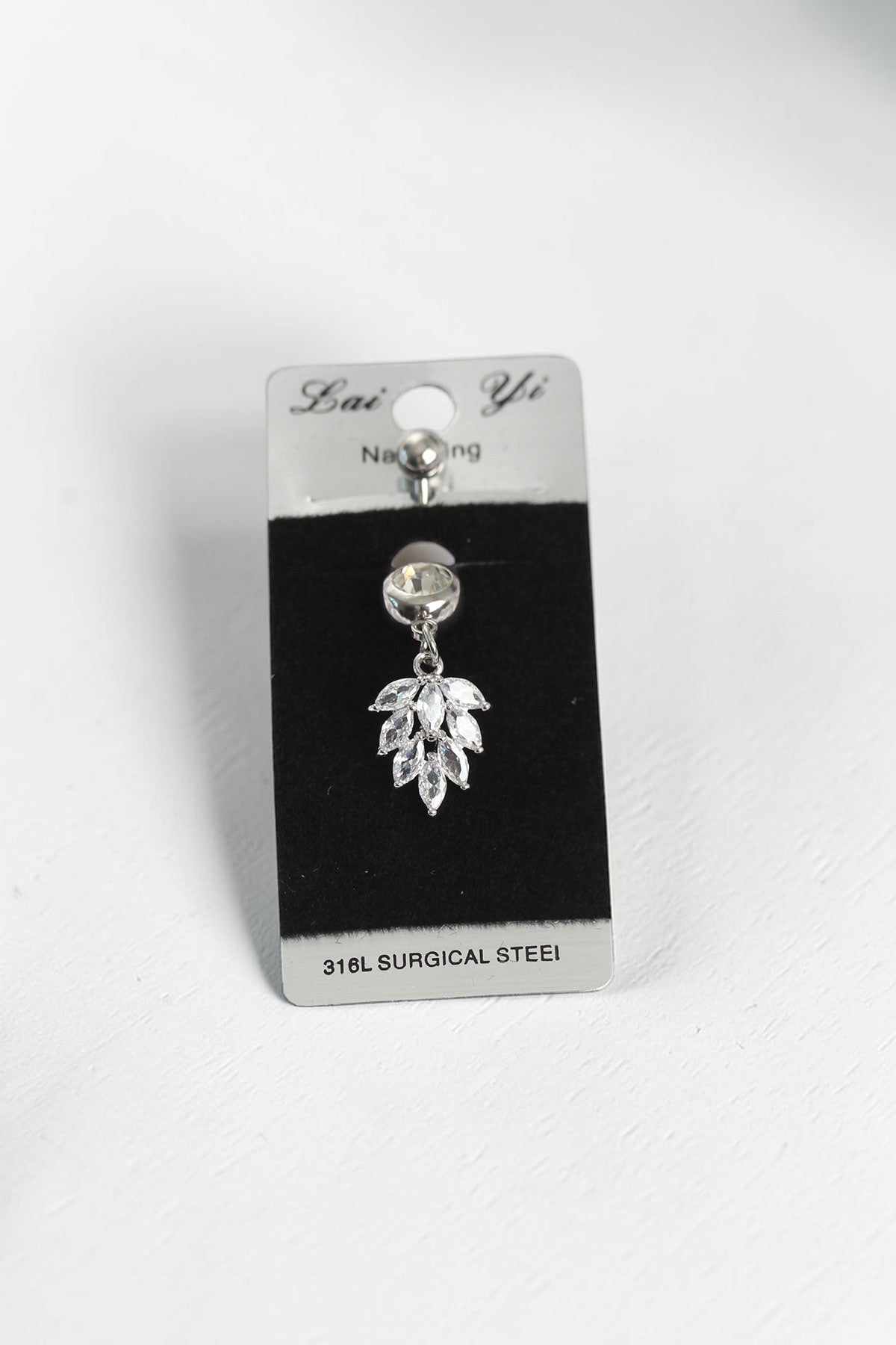VORA HOUSE 316L surgical steel belly button ring featuring a dangling marquise-cut zircon stone wheat leaf design.
